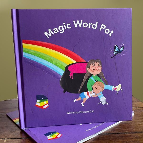 Stack of 'Magic Word Pot' children’s books by Efrossini C.K., with purple covers featuring a rainbow, a black pot with pink liquid, a woman hugging a child in mid-air, a blue butterfly, and a stack of colorful books, placed on a wooden table.